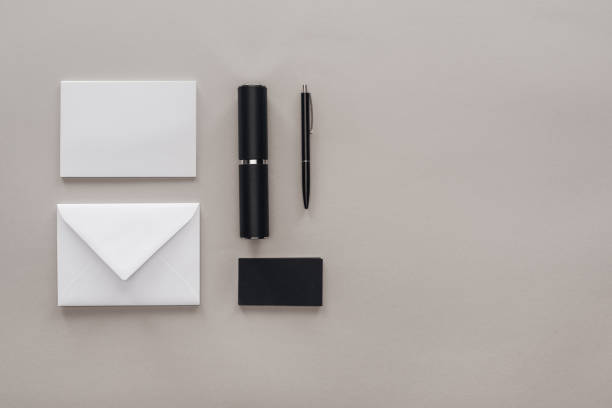istock flat lay with black and white stationery on grey background 1143512287