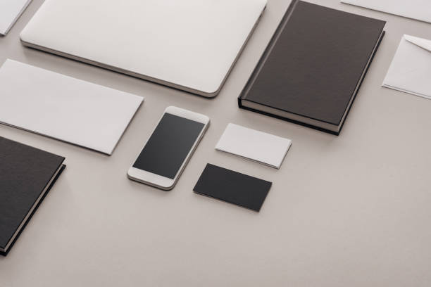 istock flat lay with gadgets and stationery on grey background 1143512591