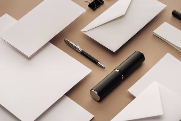 istock Envelopes, pen, paper clip, case and sheets of paper with copy space 1143512609