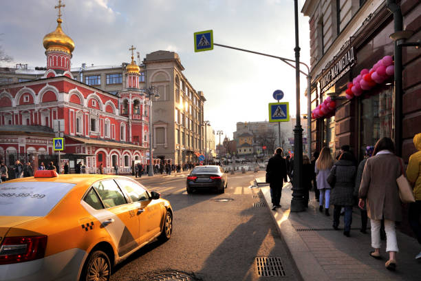Moscow, Russia - April 31, 2019: The movement of cars and pedestrians on the street Solyansky passage.