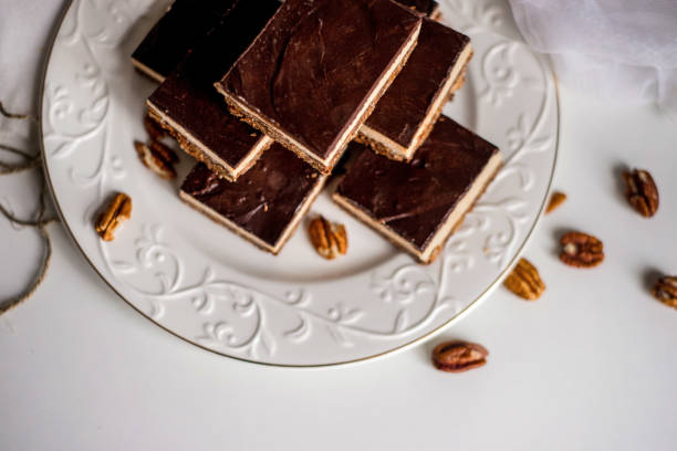 istock tasty chocolate authentic canadian dessert Nanaimo with nuts in healthy version - plant based and shugar free 1143513498