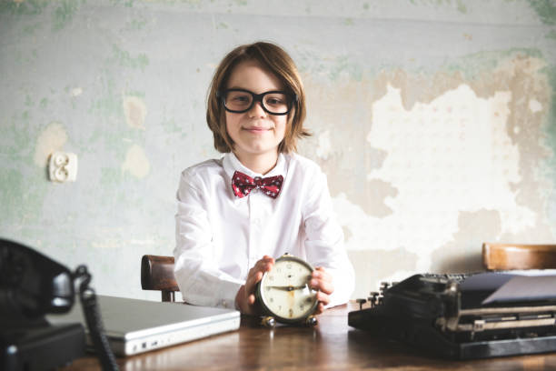 istock Young Boy Businessman at the Office 1143514581