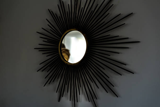 istock Beautiful design mirror in sun shape 1143516734