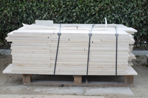 Wooden pallets with packed polished limestone for cladding Wooden pallet with polished limestone for cladding white units stock pictures, royalty-free photos & images