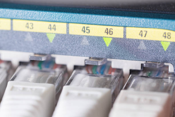 istock Close-up of high speed network switch and cables in datacenter 1143523932