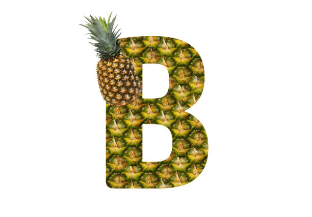 istock Alphabet letter B made from pineapple on a white background. Tropical fruit pineapple diet summer food. 1143524757