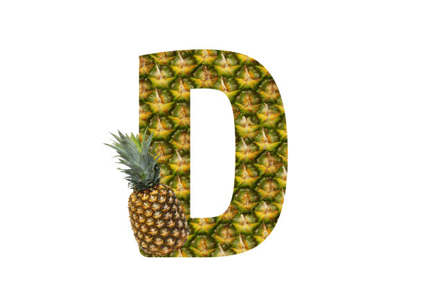 istock Alphabet letter D made from pineapple on a white background. Tropical fruit pineapple diet summer food. 1143525372