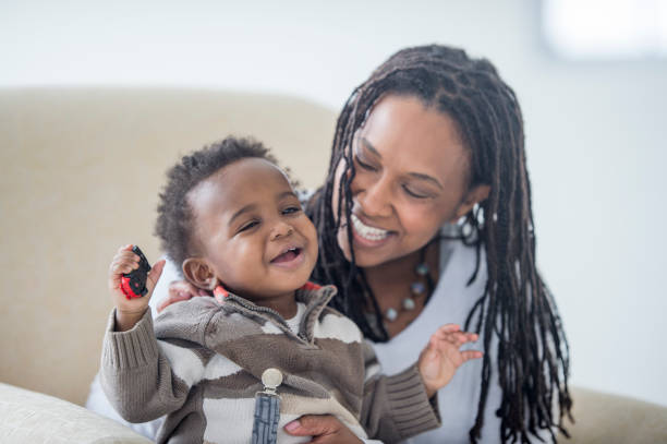 istock Laughing mother and baby 1143525587