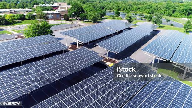 Solar Energy Power In Car Station Aerial Drone View Of Solar Panel Covered Parking Roof Stock Photo - Download Image Now