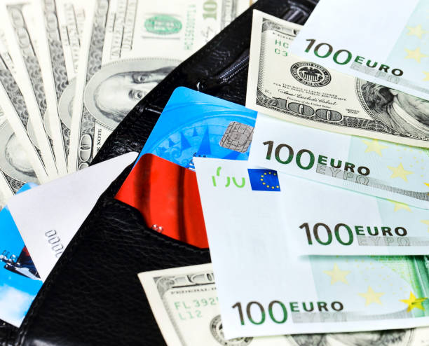 istock Black wallet with credit cards 1143526439
