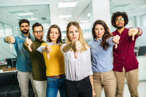 istock Group of Business people showing thumb down 1143526457