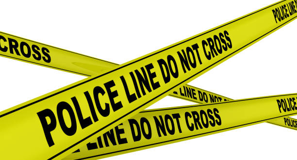 istock Police line. Do not cross. Yellow warning tapes 1143526505