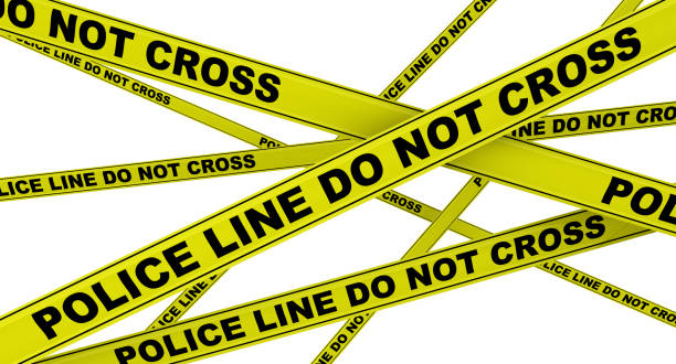 istock Police line. Do not cross. Yellow warning tapes 1143526508