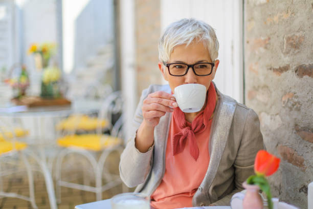 istock Mature woman's seat on the terrace 1143526610