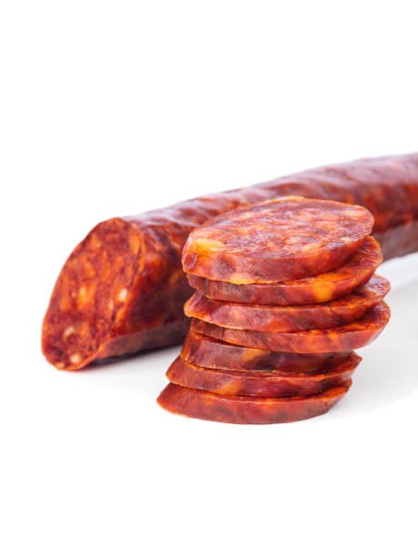 istock Iberian chorizo, Spanish chorizo or Spanish sausage cut into slices placed one on another on a white background, typical spanish tapa 1143529006