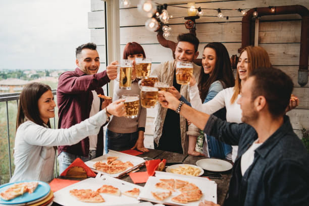 istock Pizza night with friends on the rooftop 1143529026