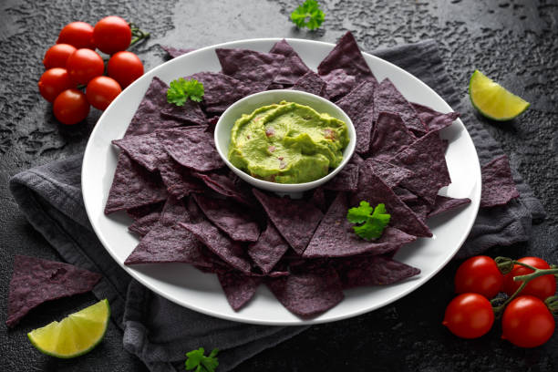 istock Blue corn Organic tortilla chips with Guacamole 1143529035