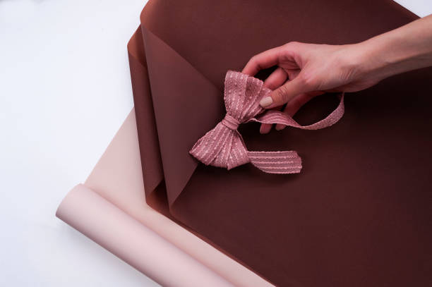 istock floral paper (packaging) with a decorative bow for making flower arrangements 1143531718