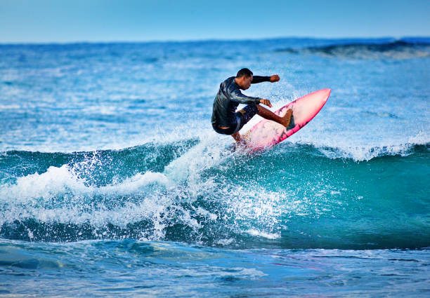 istock Surfer Surfing in Poipu Beach, Kauai,Hawaii 1143533017