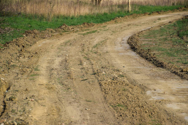 istock Dirt road leveled by a grader. Road in village 1143538334