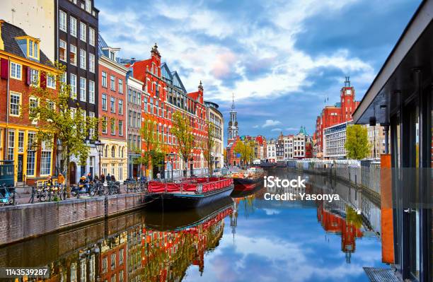 Channel In Amsterdam Netherlands Houses River Amstel Stock Photo - Download Image Now