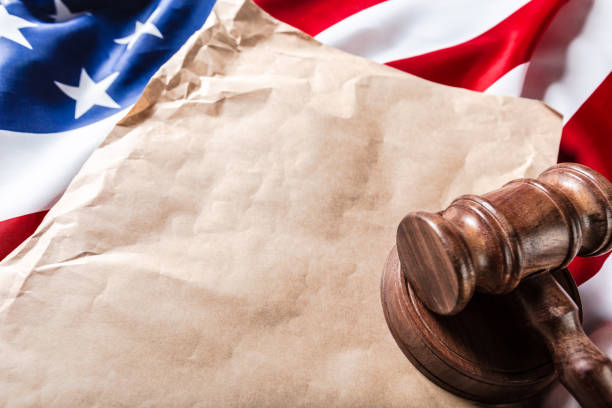istock Wooden gavel and USA flag 1143539921