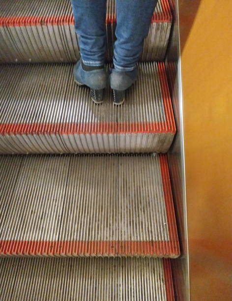 istock feet on the escalator in the subway 1143540002