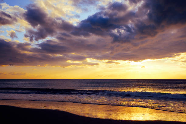 istock spectacular sunset on the beach 1143540656
