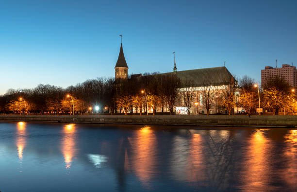 Amazing Night View of the Kaliningrad Cathedral on the island of Kant in Russia Amazing Night View of the Kaliningrad Cathedral on the island of Kant in Russia immanuel stock pictures, royalty-free photos & images