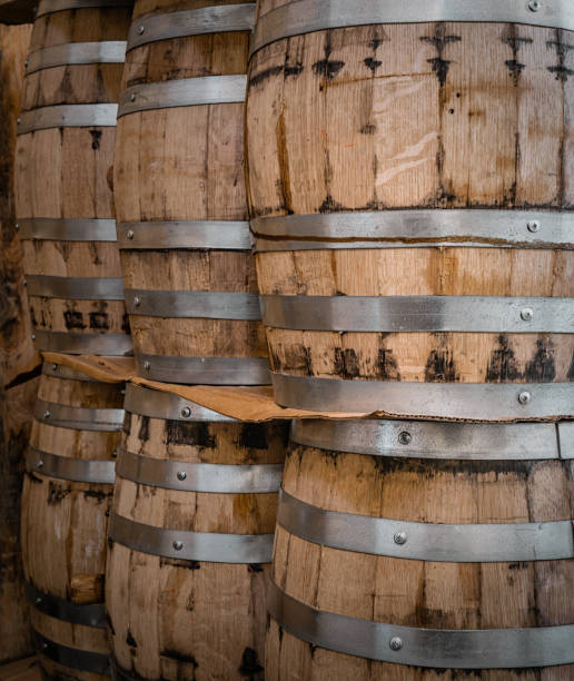 istock Multitude of oaks barrels for alcohol production 1143544336
