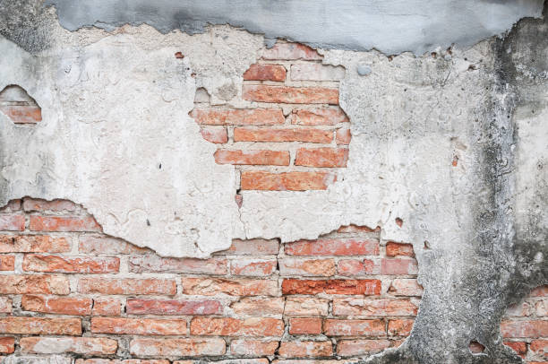 istock Old cracked concrete vintage brick wall background, Textured background, old brick wall pattern 1143545565