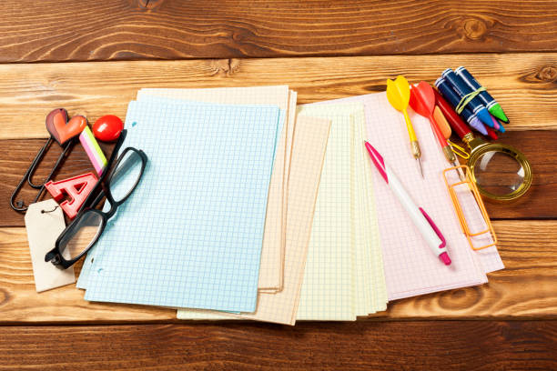 istock School office supplies on wooden background 1143549045