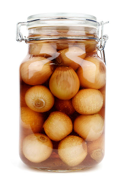 istock Isolated image of pickled onions in a jar 114354972