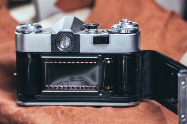 istock retro camera with 35 mm film. 1143553226