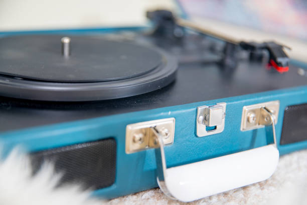 istock Vintage blue record player on the  carpet floor 1143555999