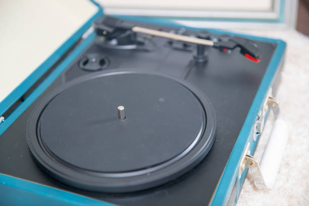 istock Vintage blue record player on the  carpet floor 1143556000