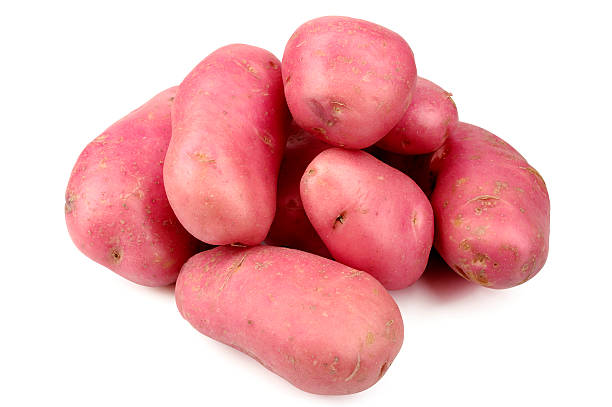 istock A pile of red potatoes on a white background 114356628
