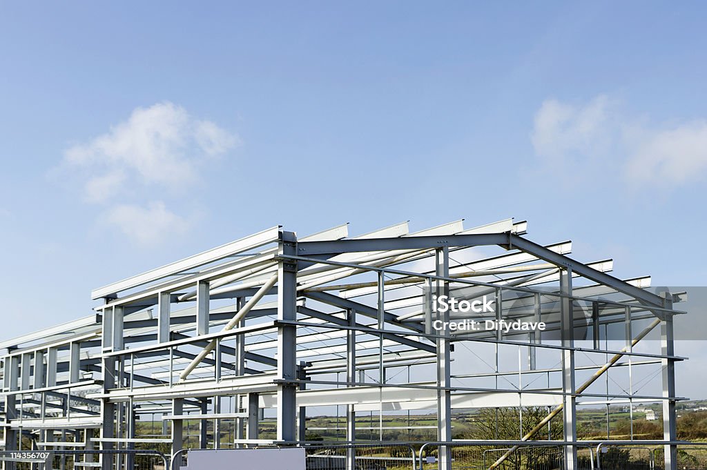 Structural Steelwork For New Industrial Building Against Blue Sky  Steel Stock Photo