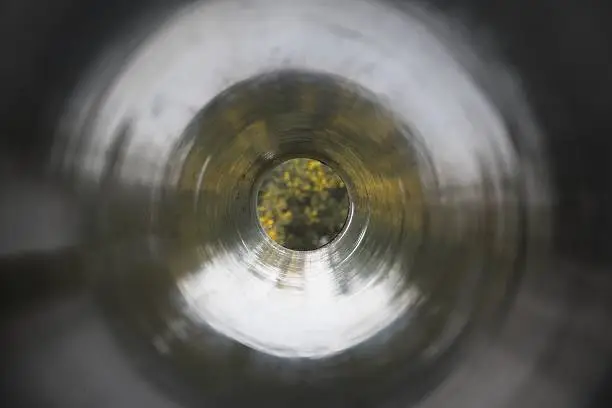 Photo of Reflections Inside A Black Plastic Pipe