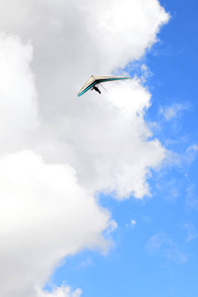 Hangglider in action Hangglider in action glider hang glider hanging sky stock pictures, royalty-free photos & images