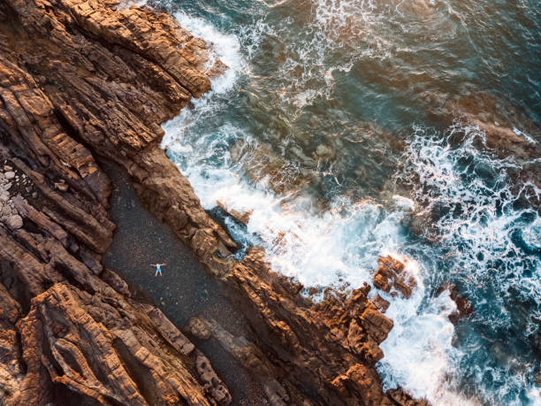 Man relaxing in the natural swimming pool
