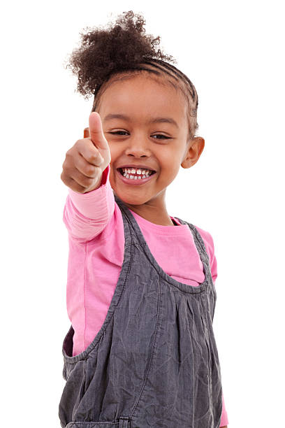 istock Cute little girl making thumbs up 114357609
