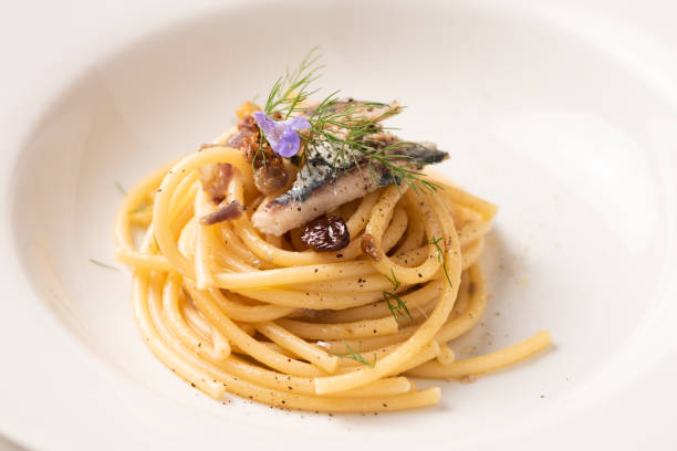Italian pasta with sardienes, close up stock photo