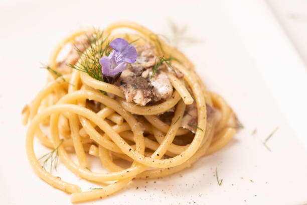 istock Italian pasta with sardienes, close up 1143576387