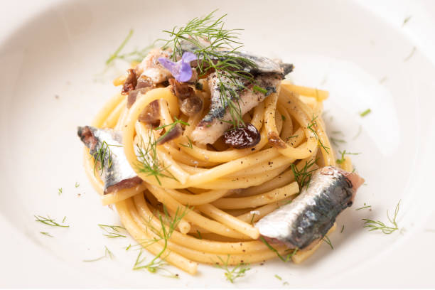 istock Italian pasta with sardienes, close up 1143576448
