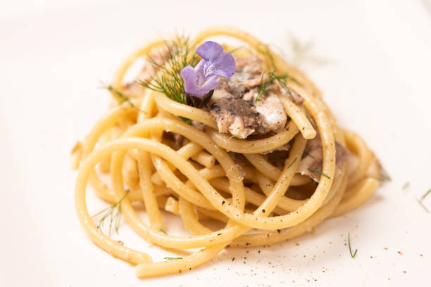 istock Italian pasta with sardienes, close up 1143576470