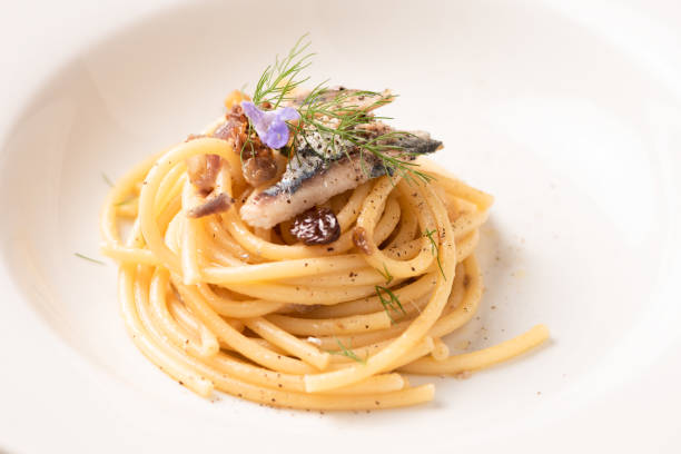istock Italian pasta with sardienes, close up 1143576555