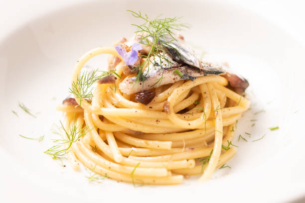 istock Italian pasta with sardienes, close up 1143577146