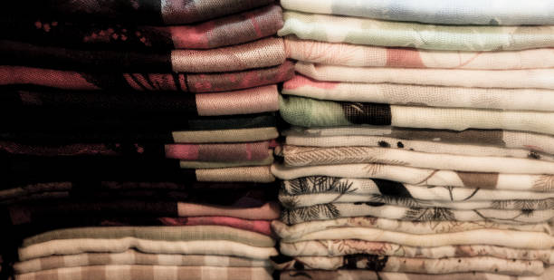 istock colorful towels, diaper, folded textiles, cloth as a background 1143578431
