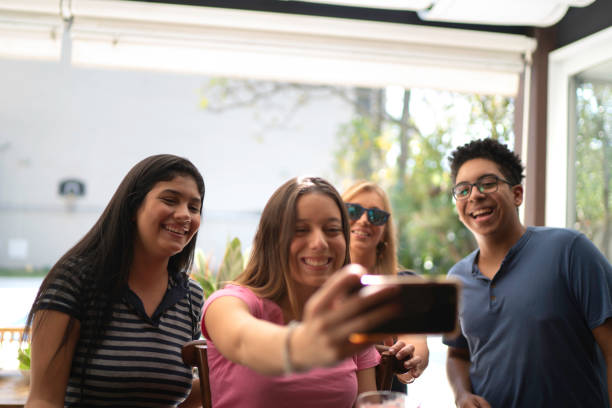 istock Friends taking a selfie during a barbecue 1143578689